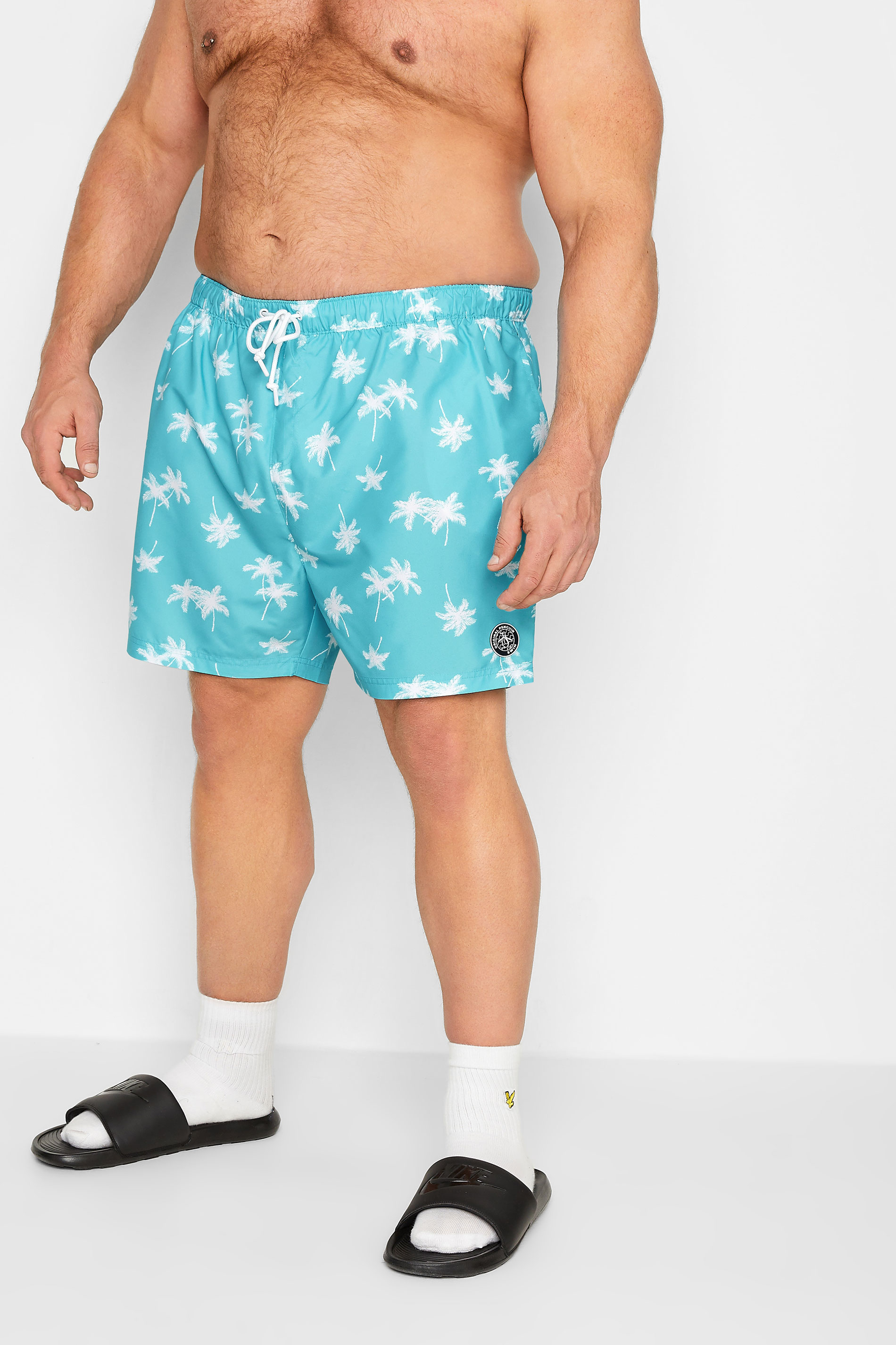 PENGUIN MUNSINGWEAR Big & Tall Blue Palm Tree Swim Shorts | BadRhino 1